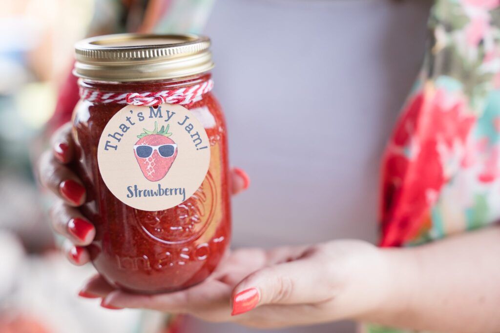 commercial photographer - woman hold a jar of jam