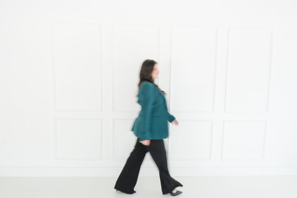 photography trends in 2026 - branding photographer - woman walking across room in blur