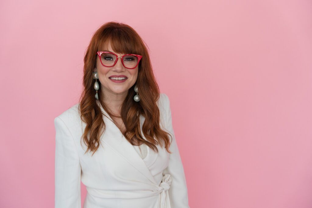 redhead woman in red glasses dallas brand photography session