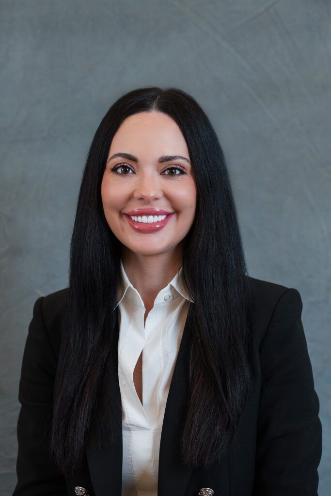 woman looking at camera during executive leadership team headshot session - dallas mobile studio headshots