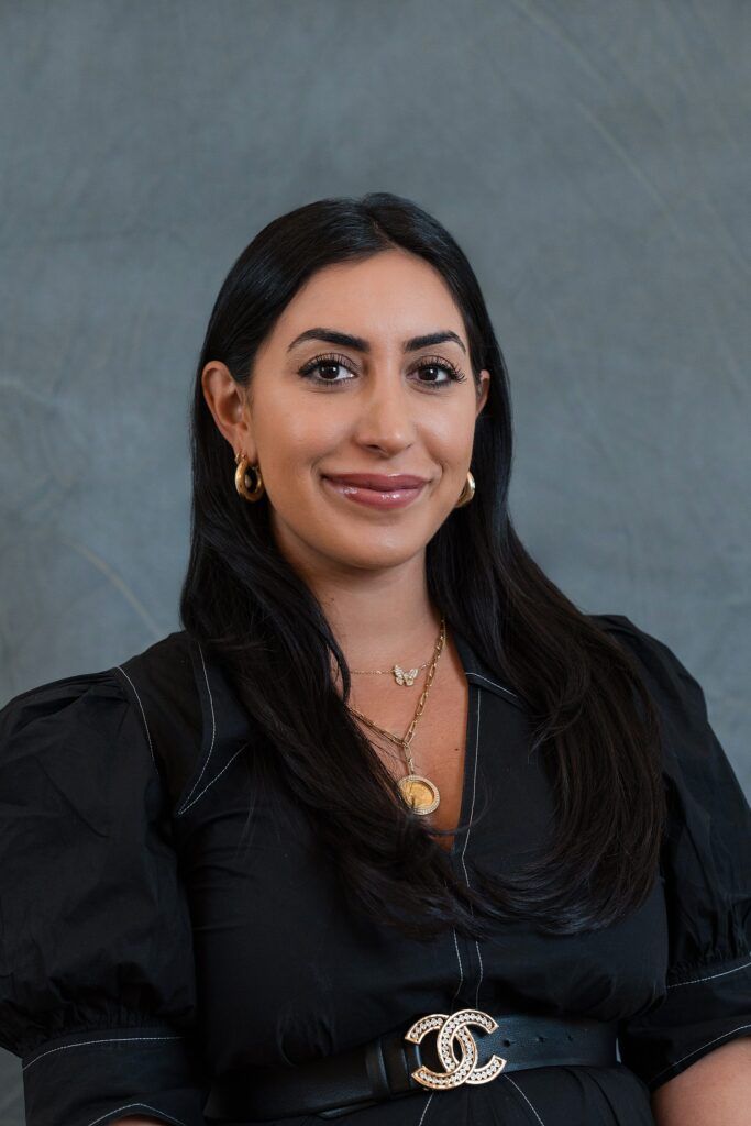woman looking at camera during executive leadership team headshot session - dallas mobile studio headshots